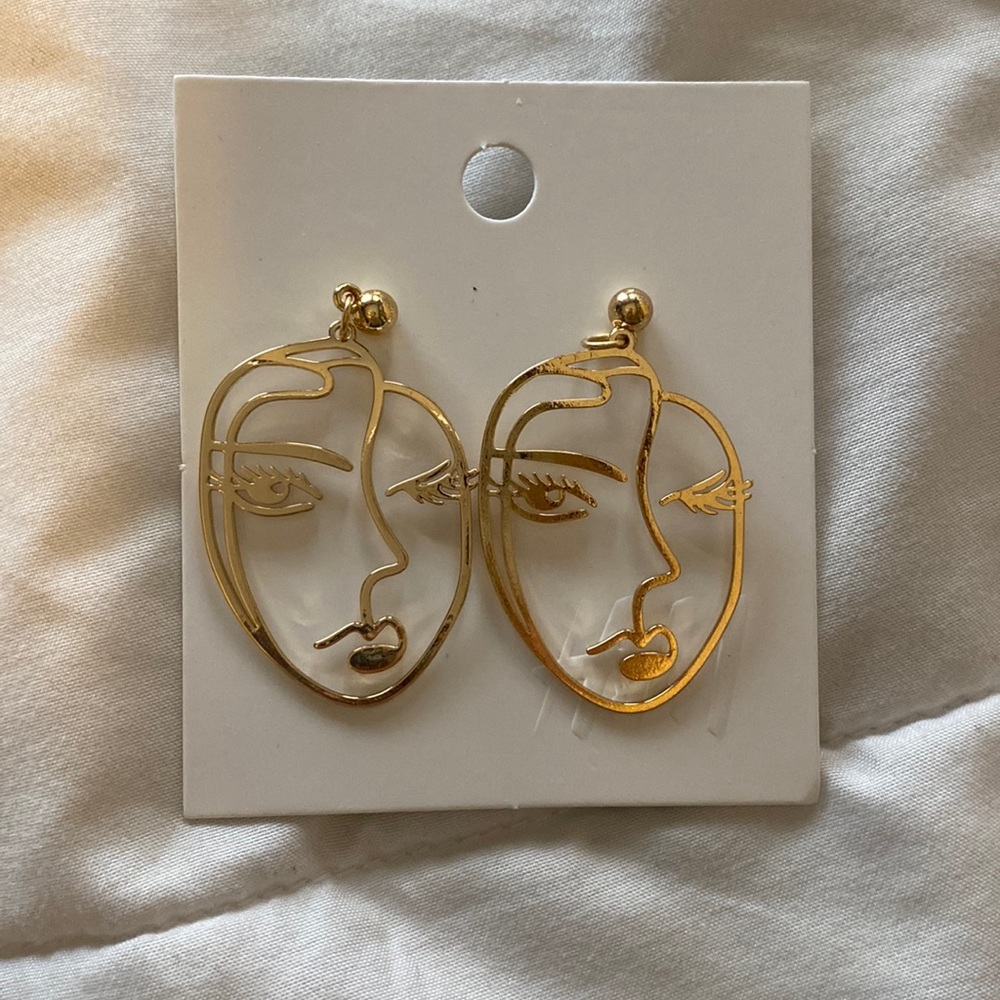 H&M Woman’s Face Earrings
